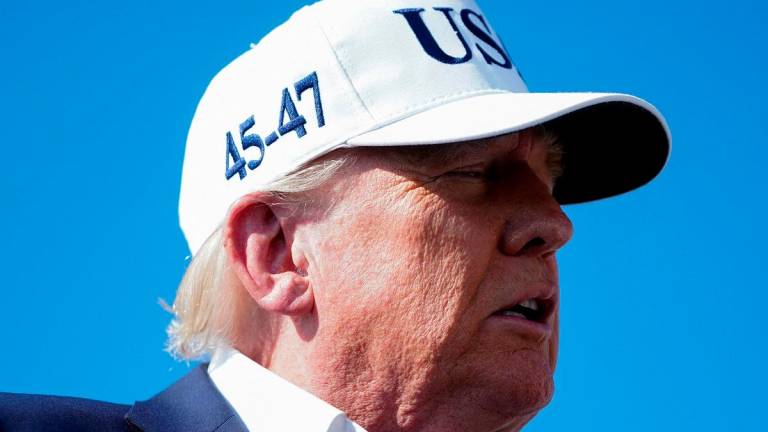 U.S. President Donald Trump speaks to members of the media upon his arrival at Morristown Airport, in Morristown, New Jersey, U.S., July 6, 2025. - REUTERS/Nathan Howard
