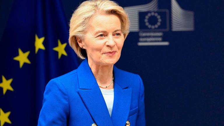 European Commission President Ursula Von der Leyen leaves after signing an EU-Grenada partnership on the eve of the Global Gateway forum at the European Commission headquarters in Brussels on October 8, 2025. - Nicolas TUCAT / AFP