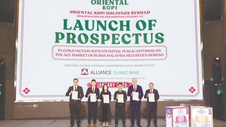 From left: Oriental Kopi Holdings head chef Ho Poh Chian, Koay, executive director Callie Chan Yen Min, managing director Datuk Chan Jian Chern, Alliance Bank Malaysia Bhd group CEO Kellee Kam Chee Khiong and Alliance Islamic Bank Bhd CEO Rizal Il-Ehzan Fadil Azim at the prospectus launch.