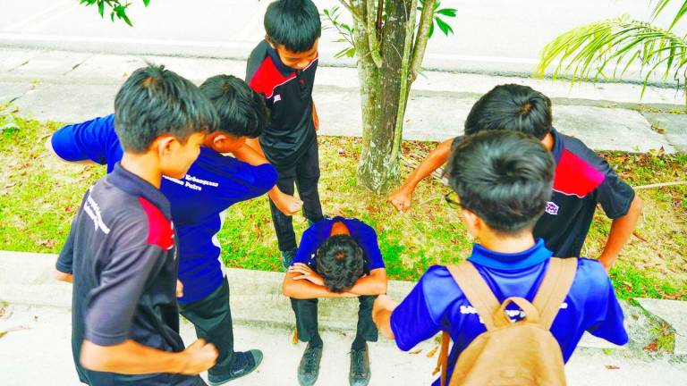 Bullying is often associated with physical violence, yet some of its most damaging forms leave no marks on the body. – AMIRUL SYAFIQ/THESUN