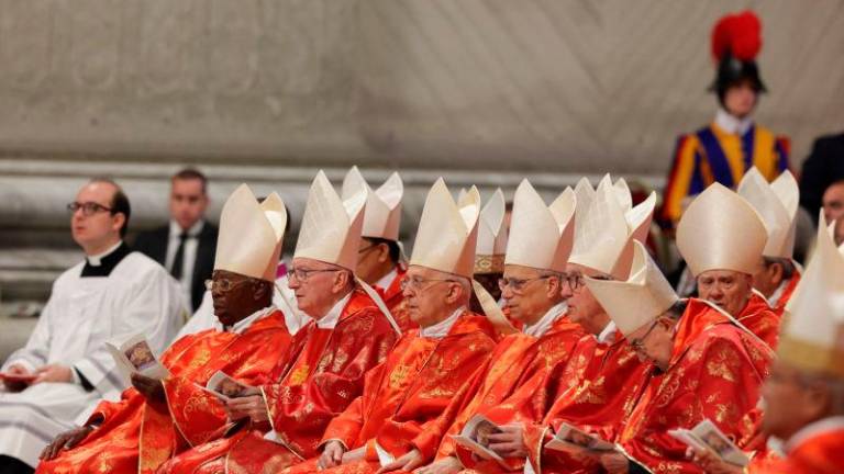 Members of the clergy gather, on the day the Dean of the College of Cardinals, Cardinal Giovanni Battista Re presides over the Holy Mass, celebrated for the election of the new pope, in St. Peter’s Basilica, at the Vatican, May 7, 2025. REUTERSpix