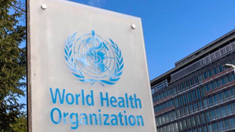 The World Health Organisation (WHO) logo is seen near its headquarters in Geneva, Switzerland, February 2, 2023. REUTERS/Denis Balibouse/File Photo