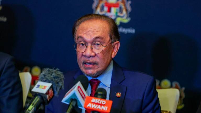Prime Minister Datuk Seri Anwar Ibrahim during a press conference at the end of his working visit to Beijing and Tianjin this week. - BERNAMAPIX