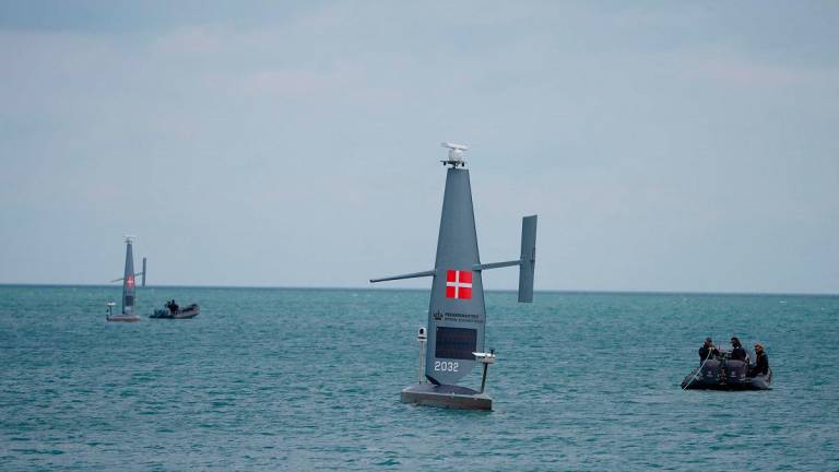 Two so called Saildrone Voyager vessels are seen in the Baltic Sea off the port of Koege, Denmark, on June 16, 2025, as the Danish Ministry of Defence's Materiel and Procurement Agency presented the deployment and capacity of the Saildrone on June 16, 2025. The deployment of the two unmanned surface vessels of the Saildrone Voyager type is part of the Danish Defence's operational testing of unmanned maritime units. During the summer of 2025, the Danish Defence will conduct an operational test of a total of four unmanned sailing units from the American company Saildrone in Danish waters. - Liselotte Sabroe / RITZAU SCANPIX / AFP