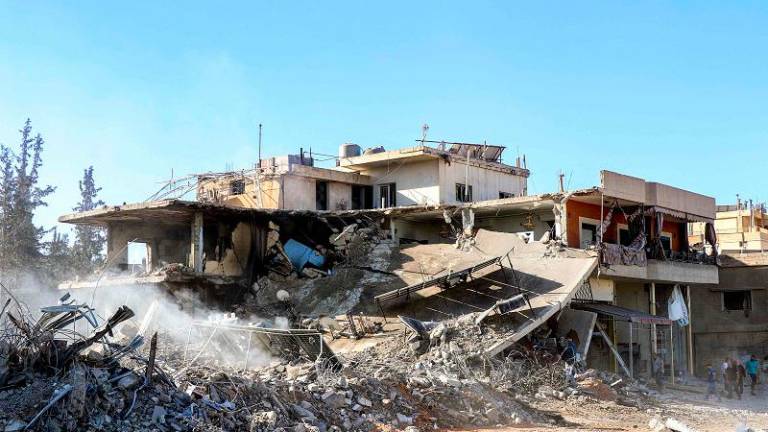 A destroyed building is pictured following an Israeli air strike in the village of Douris southeast of Baalbek in Lebanon’s eastern Bekaa Valley on October 15, 2024. Israel expanded operations in Lebanon nearly a year after Hezbollah began exchanging fire in support of its ally, Hamas, following the Palestinian group’s deadly attack on Israel on October 7, 2023. . - Nidal SOLH / AFP