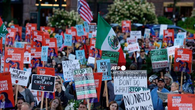 People participate in a demonstration against the planned deployment of National Guard troops in Chicago on September 6, 2025. - AFP