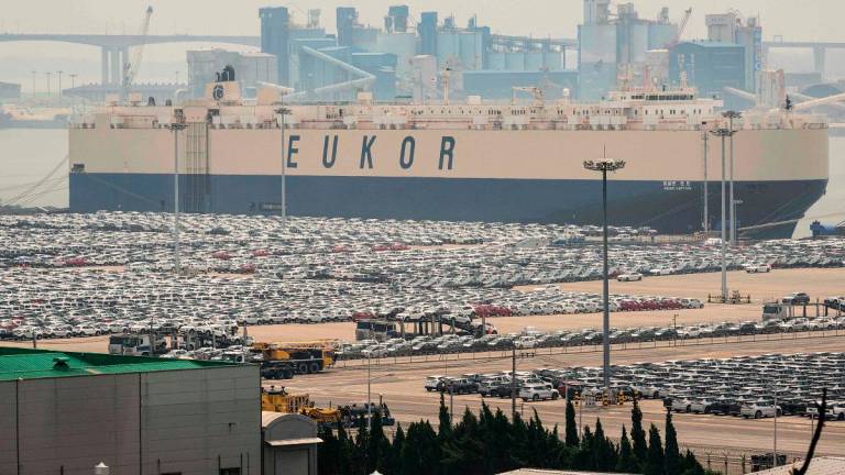 Vehicles for export are seen at a port in Pyeongtaek, southwest of Seoul on July 8, 2025. US President Donald Trump reignited his trade war by threatening more than a dozen countries with higher tariffs on July 7 - AFP pic