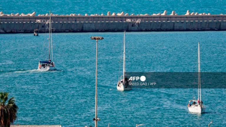 Boats from the Global Sumud Flotilla intercepted by Israeli forces in the Mediterranean sea off the Gaza Strip waters, arrive in the southern port of Ashdod on October 2, 2025. - AFP