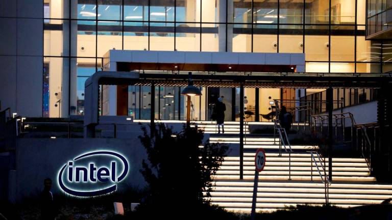FILE PHOTO: U.S. chipmaker Intel Corp’s logo is seen at the entrance to their “smart building” in Petah Tikva, near Tel Aviv, Israel December 15, 2019. REUTERS/Amir Cohen/File Photo