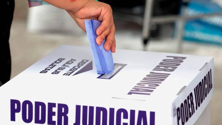 Polls opened Sunday in elections making Mexico the world’s only country to select its judges at all levels by popular vote. (Photo by STRINGER / AFP)