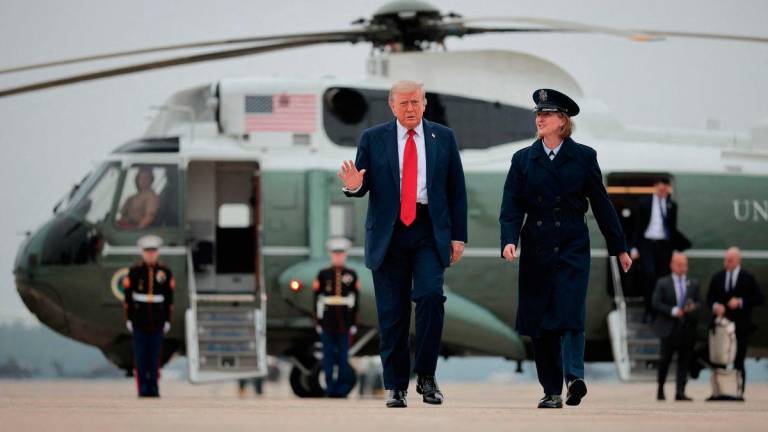 U.S. President Donald Trump walks across the tarmac before boarding Air Force One and traveling to the G7 leaders’ summit in Canada on June 15, 2025 at Joint Base Andrews, Maryland. Canada is hosting this year’s meeting of the world’s largest seven economies in Kananaskis, Alberta. Getty Images/AFP