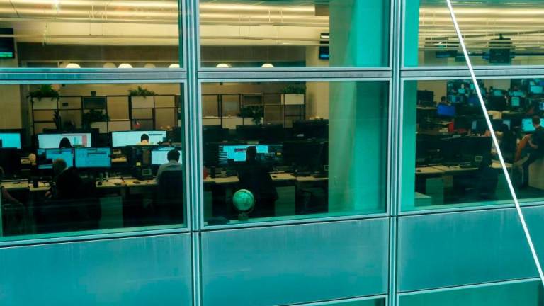 Employees working on the trading floor at the global headquarters of Goldman Sachs investment banking firm at 200 West Street in New York on Wednesday, Jan 11, REUTERSpix