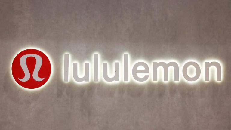 FILE PHOTO: A logo is displayed inside a Lululemon outlet retail store at Bicester Village in Oxfordshire, Britain, August 21, 2024. REUTERS/Hollie Adams/File Photo