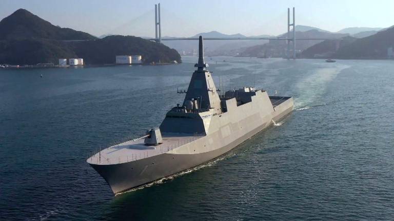 This undated handout photo released by the Australian Defence Force on August 5, 2025 shows the Japanese Maritime Self-Defence Force (JMSDF) frigate JS Mogami (FFM-1) sailing in an undisclosed location. - AFPPIX/AUSTRALIAN DEFENCE FORCE