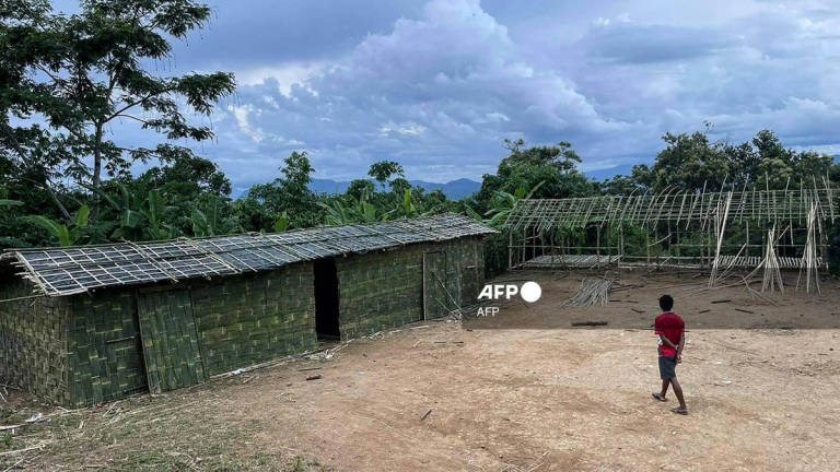 This picture taken on September 24, 2021 shows shelters for refugees at Pang village in India’s eastern state of Mizoram near the Myanmar border, after people fled across the border following attacks by Myanmar’s military on villages in western Chin state. - AFP