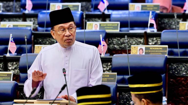 Perdana Menteri Datuk Seri Anwar Ibrahim menjawab soalan pada Mesyuarat Kedua Penggal Keempat Parlimen ke-15 di Dewan Rakyat, Bangunan Parlimen, hari ini - fotoBERNAMA