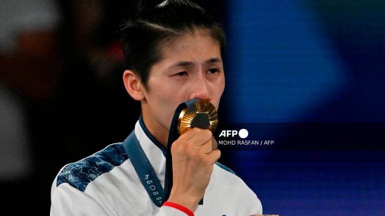 Gold medallist Taiwan’s Lin Yu-ting. - MOHD RASFAN / AFP