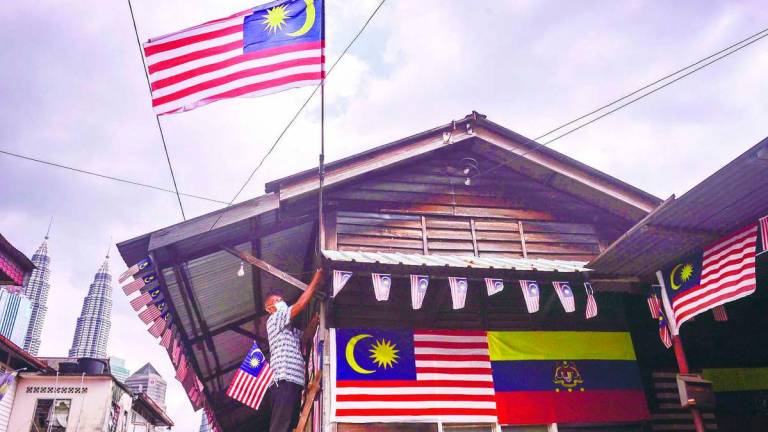 The Jalur Gemilang has always been part of our lives. But now, it feels like the flag has turned into a test. – ADIB RAWI YAHYA/ THESUN