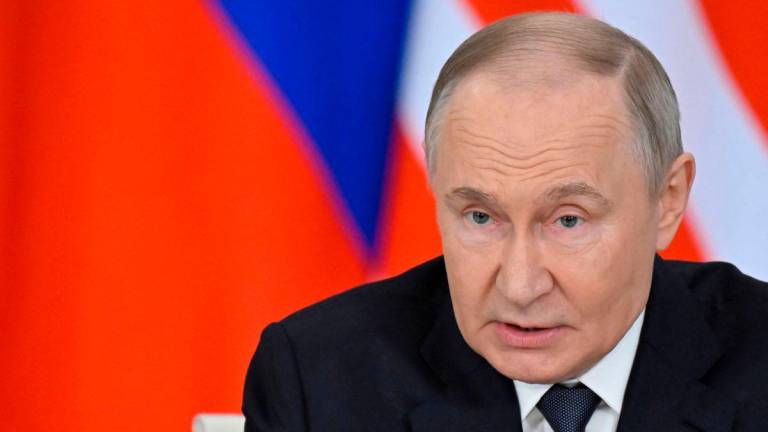 Russian President Vladimir Putin speaks during a joint media statement with Malaysia’s Prime Minister following their talks at the Kremlin in Moscow on May 14, 2025.AFPpix