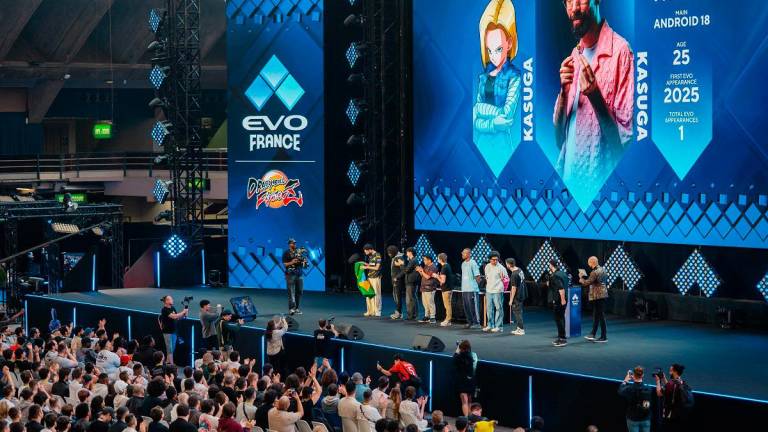 Players stand on the main stage during a Dragon Ball Z final event at the EVO France 2025 fighting game tournament in Nice, southern France on October 11, 2025. - Frederic DIDES / AFP