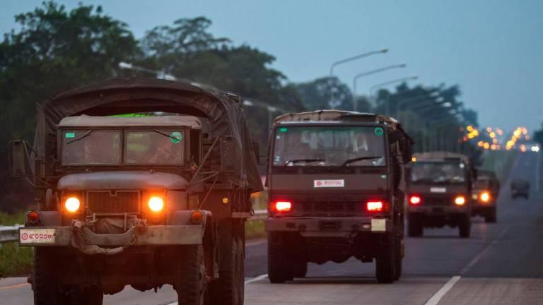 Army vehicles drive along a road in Buriram province, after Thailand scrambled an F-16 fighter jet to bomb targets in Cambodia following artillery volleys from both sides that killed civilians, Thailand, July 25, 2025. - REUTERSPIX
