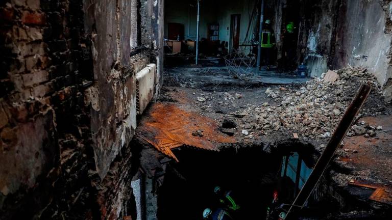Rescuers work inside a Ukrainian government headquarters building damaged on Sunday during a Russian drone and missile strike, amid Russia’s attack on Ukraine, in Kyiv, Ukraine September 8, 2025. REUTERS/Alina Smutko TPX IMAGES OF THE DAY