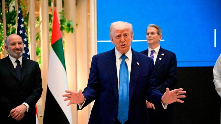 US President Donald Trump attends a business forum in Abu Dhabi on May 16, 2025. AFPpix