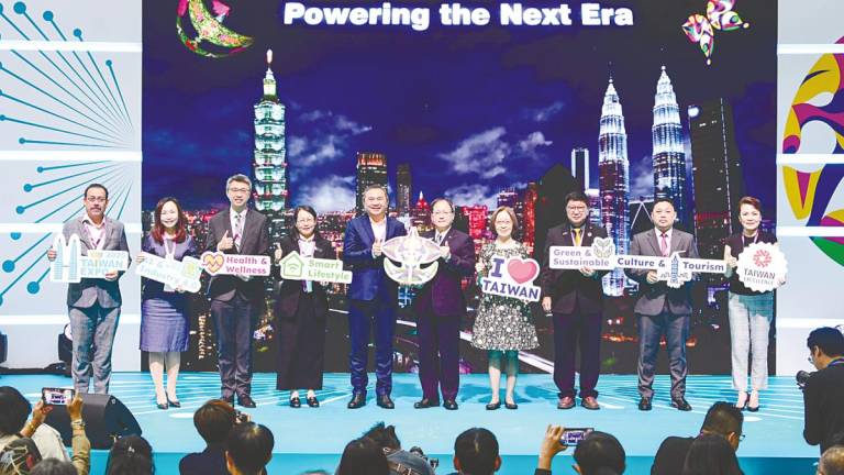 Taiwan External Trade Development Council president and CEO Simon Wang (fifth, right) at the launch and activation ceremony of Taiwan Expo 2025 in Malaysia at Kuala Lumpur Convention Centre yesterday. Also present are Mazlan (second, right), Yeh (fourth, tight) and Soh (third, right). – Bernamapic