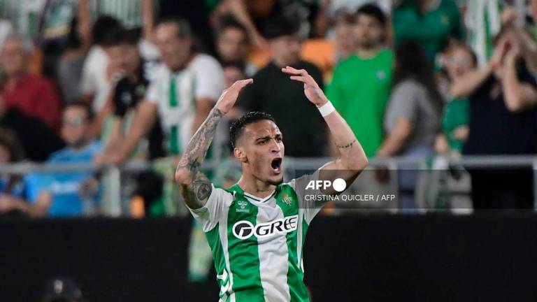 Real Betis' Brazilian forward #07 Antony celebrates scoring his team's second goal during the UEFA Europa League 1st round day 1 football match between Real Betis and Nottingham Forest at the Benito Villamarin stadium in Seville on September 24, 2025. - AFP