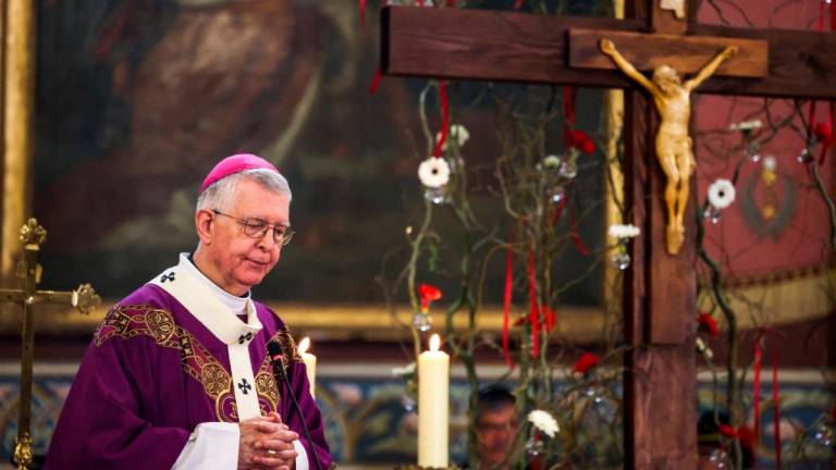 Archbishop of Toulouse, Monsignor Guy de Kerimel leads a mass at Notre Dame de l’Assomption church before the induction of Prince Albert II of Monaco into the Fronton Wine Brotherhood in Fronton, southwestern France on February 26, 2023. (Photo by Charly TRIBALLEAU / AFP)