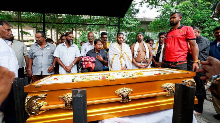 Sharavanahvel, 31, son of the late former Natural Resources and Environment Minister Datuk Seri G. Palanivel, during his father’s funeral ceremony at the Federal Territory Indian Cemetery Organisation, Sentul, today. - BERNAMApix