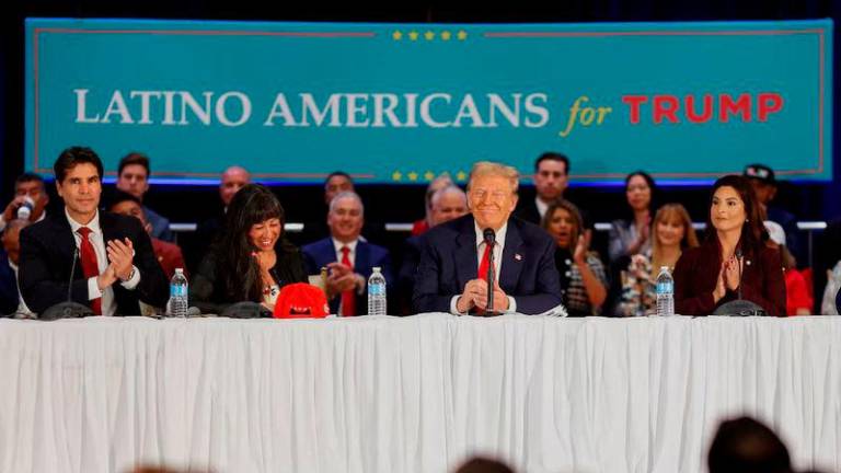 Then-Republican presidential candidate and former U.S. President Donald Trump reacts during a roundtable discussion with Latino community leaders in Doral - REUTERSpix