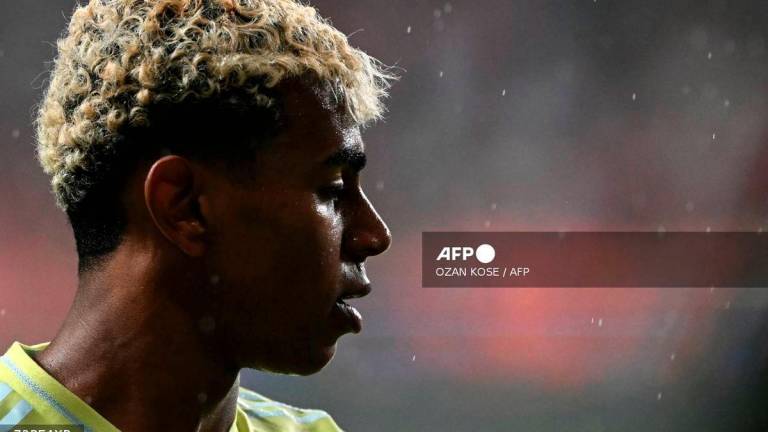 Spain's forward #19 Lamine Yamal looks on during the FIFA World Cup 2026 Group E qualification football match between Turkey and Spain at the Konya Buyuksehir Belediye Stadium, in Konya, on September 7, 2025. (Photo by Ozan KOSE / AFP)