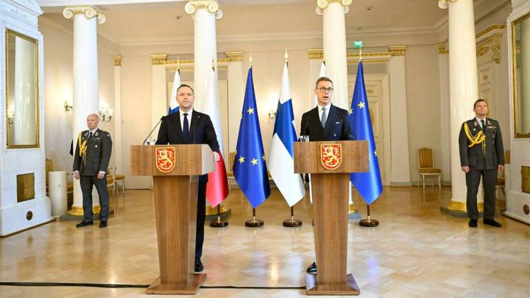 President of Poland Karol Nawrocki (L) and President of Finland Alexander Stubb (R)attend a press conference after a meeting at the Presidential Castle in Helsinki on September 9, 2025. (Photo by Roni Rekomaa / LEHTIKUVA / AFP)