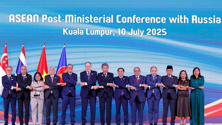 Malaysia’s Foreign Minister Datuk Seri Mohamad Hasan (seventh, left) and Russian Foreign Minister Sergey Lavrov (sixth, left) poses for a photo after the ASEAN Post-Ministerial Conference with Russia, in conjunction with the 58th ASEAN Foreign Ministers’ Meeting (AMM) - Bernamapix