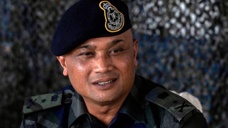 Commander of the Southeast Brigade of the General Operations Force (PGA), Datuk Nik Ros Azhan Nik Ab Hamid, speaks to media practitioners after conducting a survey along the Golok River from Pengkalan Kubor to Rantau Panjang yesterday. – BERNAMA