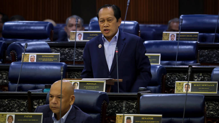 Deputy Minister of Works, Datuk Seri Ahmad Maslan, speaks during the oral question-and-answer session held in conjunction with the Second Meeting of the Fourth Session of the 15th Parliament at the Parliament Building. – BERNAMA