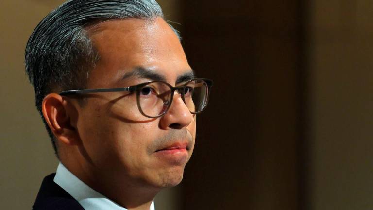 Communications Minister Datuk Fahmi Fadzil. - BERNAMA