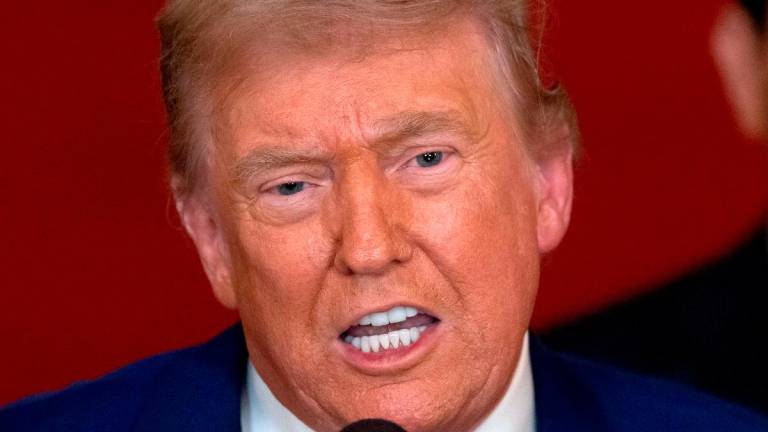 US President Donald Trump addresses the nation from the White House in Washington, DC on June 21, 2025, following the announcement that the US bombed nuclear sites in Iran. (Photo by CARLOS BARRIA / POOL / AFP)