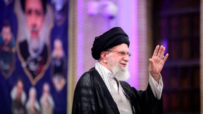 Iran’s Supreme Leader Ayatollah Ali Khamenei waves during a meeting in Tehran, Iran, May 20, 2025. Office of the Iranian Supreme Leader/WANA (West Asia News Agency)/Handout via REUTERS