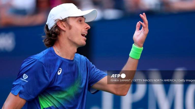 Alex de Minaur of Australia reacts while playing against Felix Auger-Aliassime of Canada during their Men's Quarterfinal match on Day Eleven of the 2025 US Open at USTA Billie Jean King National Tennis Center on September 3, 2025 in the Flushing neighborhood of the Queens borough of New York City. - Ishika Samant/Getty Images/AFPPIX