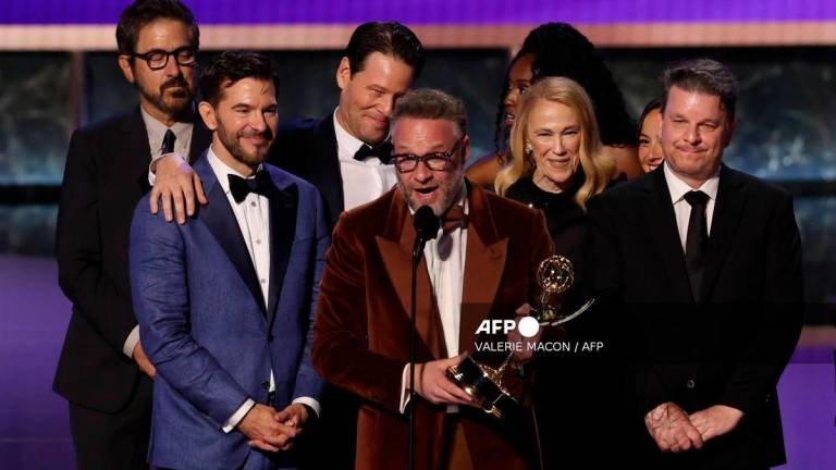 US-Canadian actor Seth Rogen accepts the Outstanding Comedy Series award for “The Studio” during the 77th Primetime Emmy Awards at the Peacock Theatre at LA Live in Los Angeles on September 14, 2025. (Photo by VALERIE MACON / AFP)