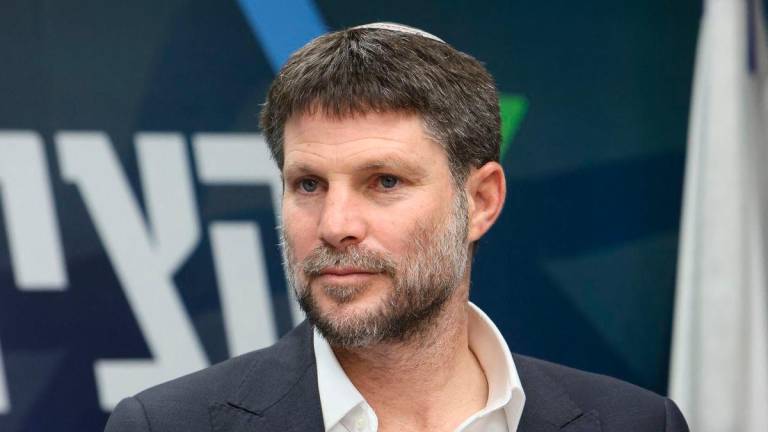 Israel’s Finance Minister and leader of the Religious Zionist Party Bezalel Smotrich attends a meeting at the parliament, Knesset, in Jerusalem on March 20, 2023. (Photo by GIL COHEN-MAGEN