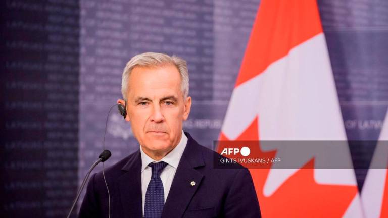 Mark Carney, Prime Minister of Canada addresses a press conference with Latvian Prime Minister Evika Silina after their meeting on August 26, 2025 in Riga, Latvia. - AFP