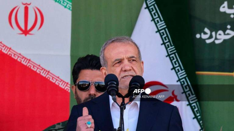 Iran’s President Masoud Pezeshkian - (Photo by Atta KENARE / AFP)