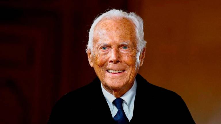 FILE PHOTO: Designer Giorgio Armani appears at the end of his Haute Couture Spring/Summer 2025 collection show for Giorgio Armani Prive in Paris, France, January 28, 2025. REUTERS