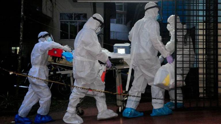 A patient, who according to medics is suffering from Nipah infection, is shifted to an ICU of Nipah isolation ward in Kozhikode Medical College in Kozhikode district in the southern state of Kerala - REUTERSpix