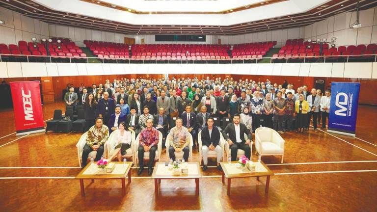 Malaysian and Indonesian delegates at DEX CONNEX Indonesia.
