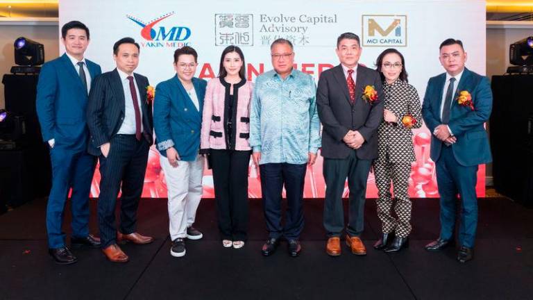 From left to right: Mr. Alex Choo - Regulatory Compliance Counsel of MCI Capital, Mr. Jerry Chua - Managing Partner &amp; Chief Executive Officer of Evolve Capital Advisory, Ms. Cannis Chan - Chairman of MCI Capital, Ms. Chryseis Tan - Executive Director of Berjaya Corporation Berhad, YB Dato’ Sri Tiong King Sing - Minister of Tourism, Art and Culture, Mr. Patrick Tan - Founder of Yakin Medic Sdn Bhd, Ms. Florence Yap - Managing Director of Yakin Medic Sdn Bhd, Mr. Damon Chan - Senior Advisor of MCI Capital at the Yakin Medic’s “Pre-IPO Launching” Ceremony