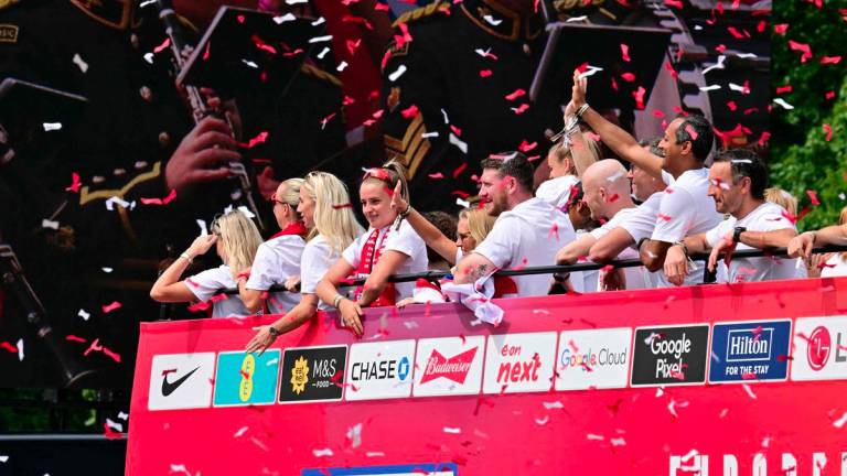 Confetti falls during the England women's national football team homecoming victory parade on the Mall outside Buckingham Palace in London on July 29, 2025 to celebrate the team winning Euro 2025. - AFPPIX